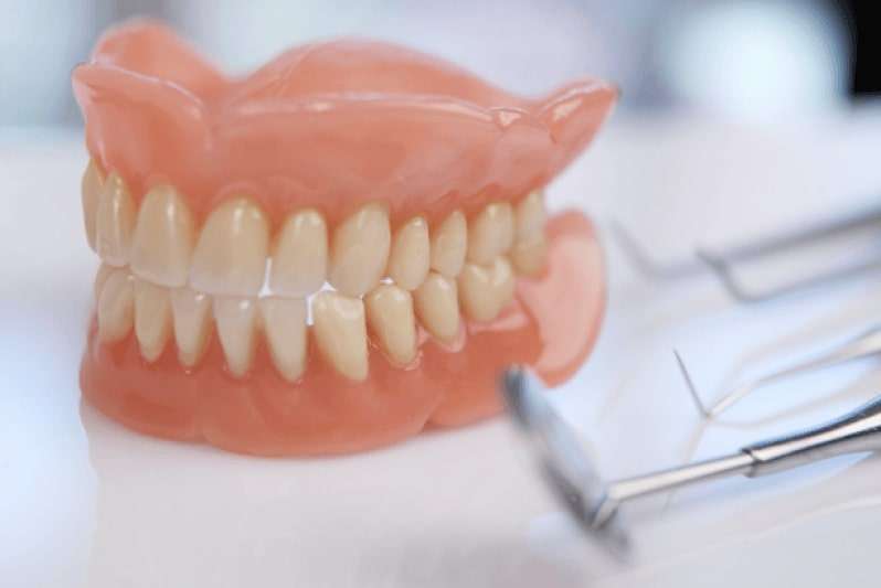 prótese dentaria quanto custa